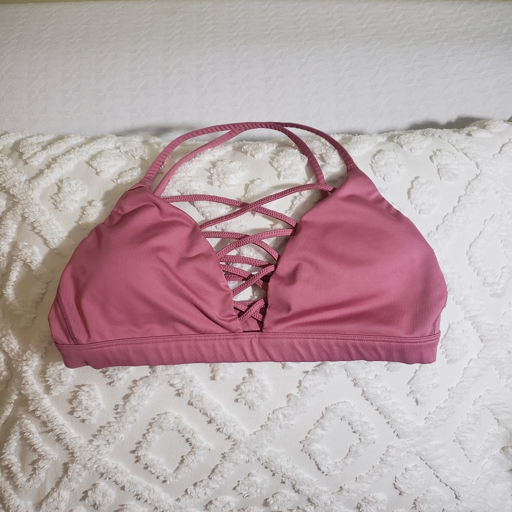 No name  size S swim top pink.